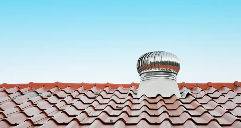 air vent on a red roof