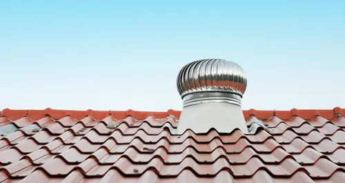 air vent on a red roof