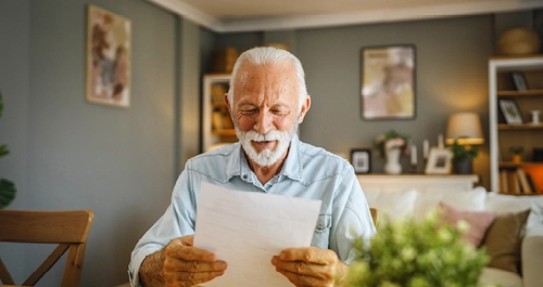 Homeowner reading electricity bill