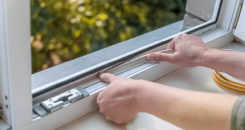 Adding weather stripping to window