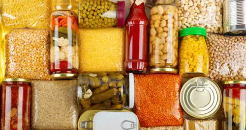 Non-perishable food laid on kitchen table