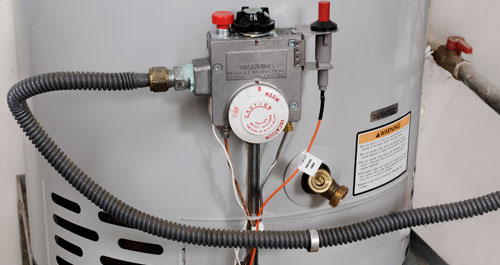 Close up of water heater controls